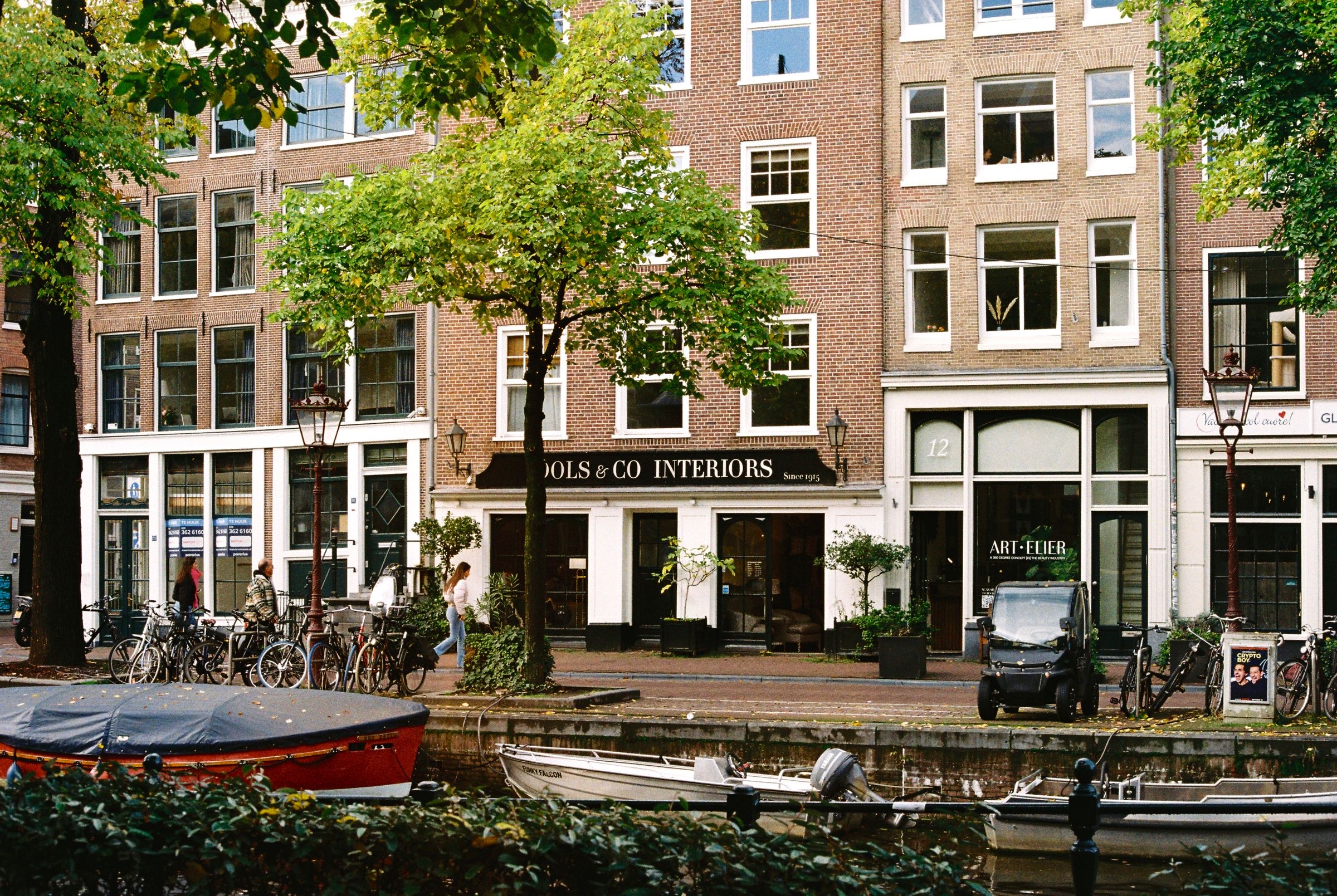 Canal-side office buildings in Amsterdam on a working day