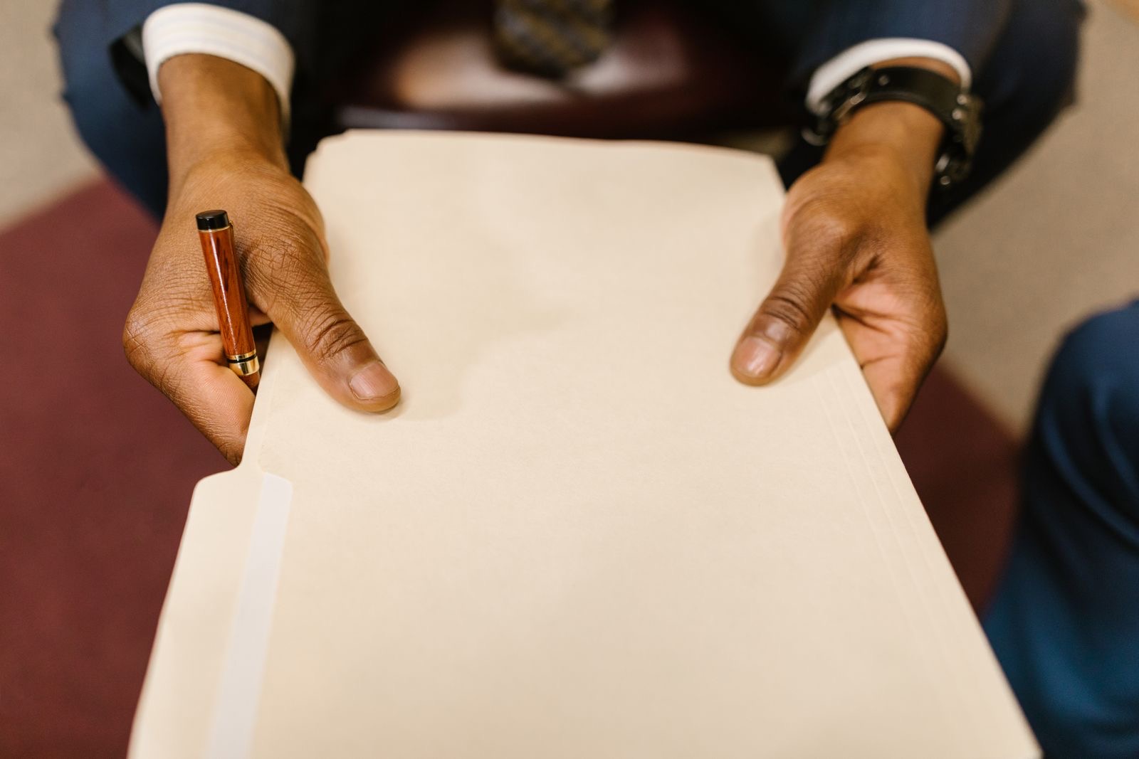Draft articles of association and a shareholders' register on a desk, assembled for the notary